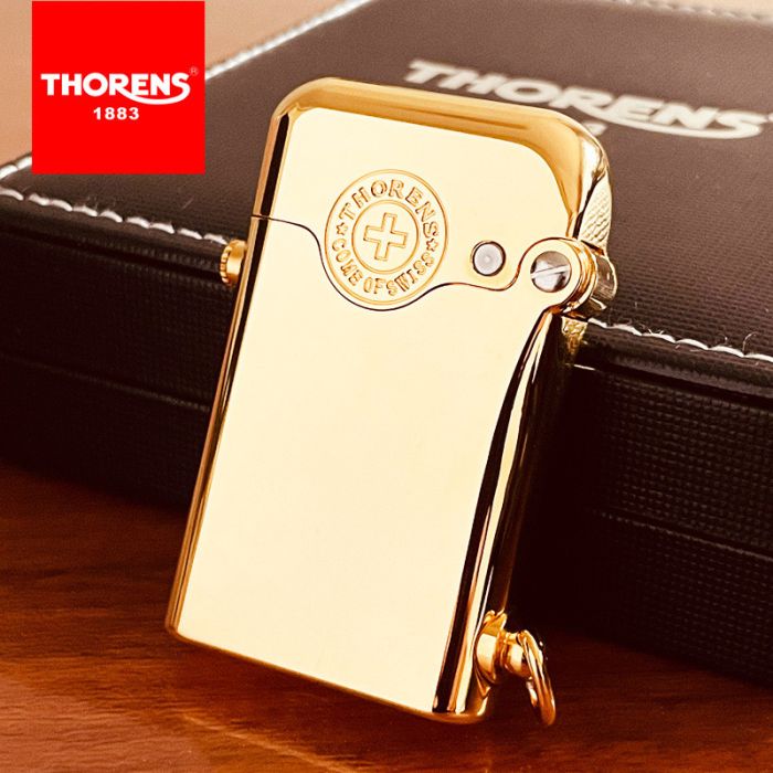 Изысканная бензиновая зажигалка Thorens золотого цвета