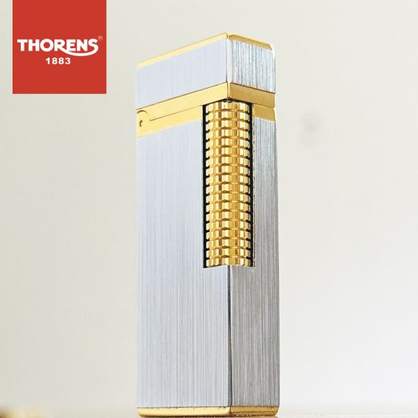 Премиальная газовая зажигалка THORENS в серебристо-золотистом цвете.